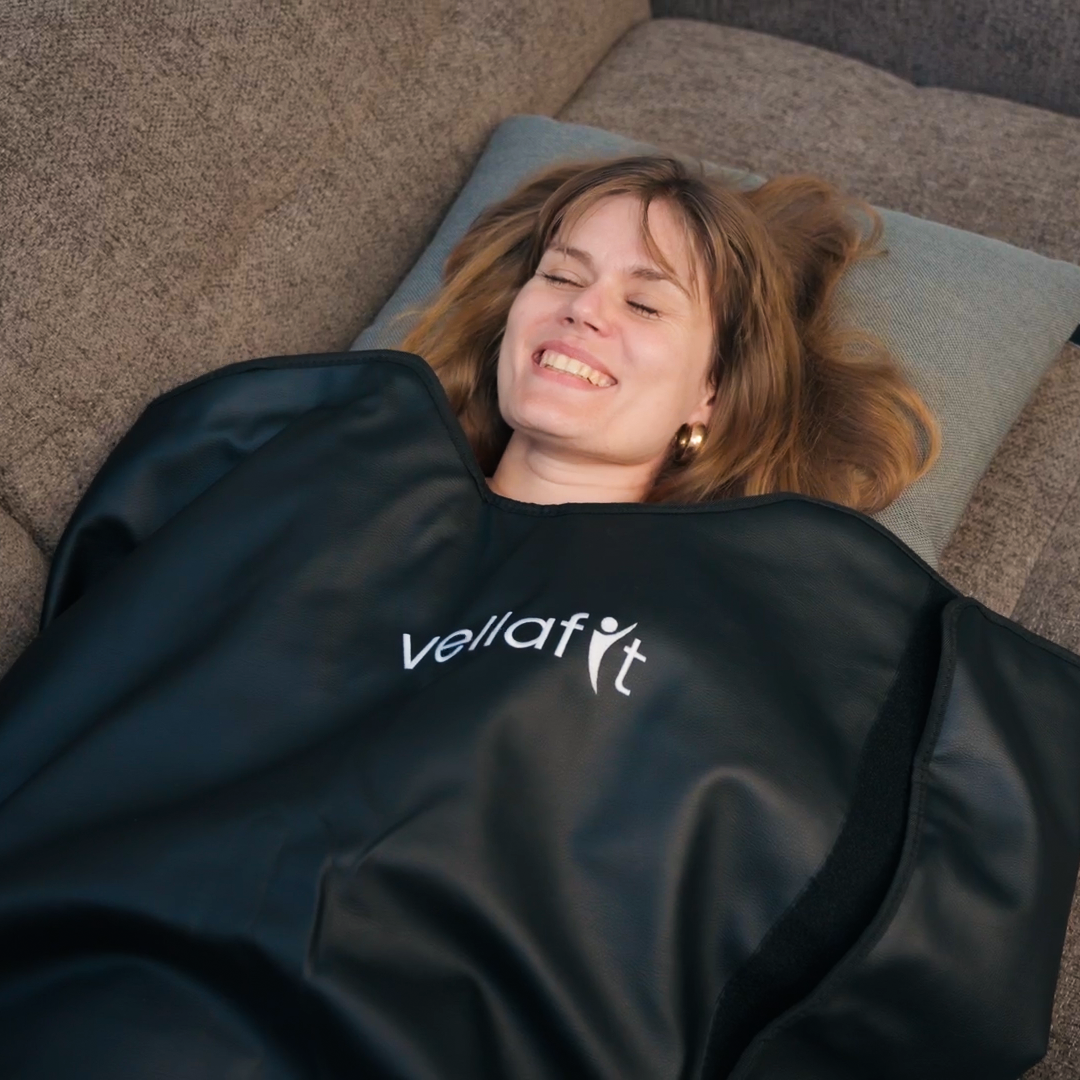 Kvinder bruger Vellafit Infrarød Saunatæppe